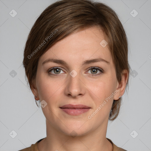 Joyful white young-adult female with medium  brown hair and grey eyes