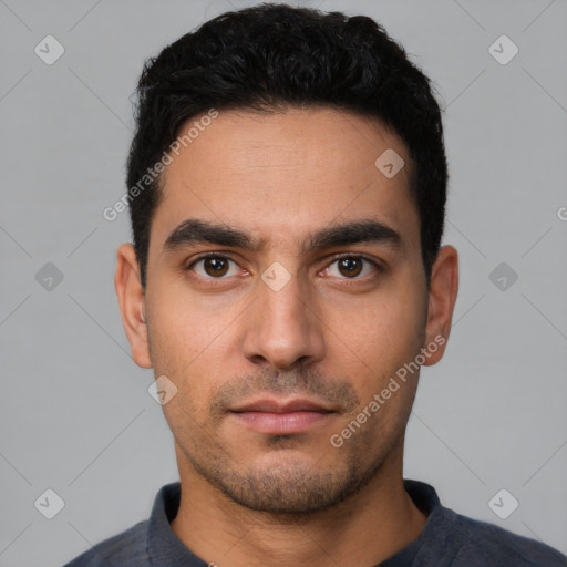 Neutral white young-adult male with short  black hair and brown eyes