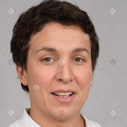 Joyful white adult female with short  brown hair and brown eyes