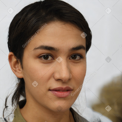 Joyful latino young-adult female with medium  brown hair and brown eyes