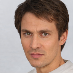 Neutral white adult male with short  brown hair and brown eyes