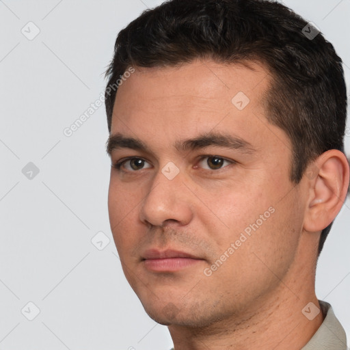 Neutral white young-adult male with short  brown hair and brown eyes