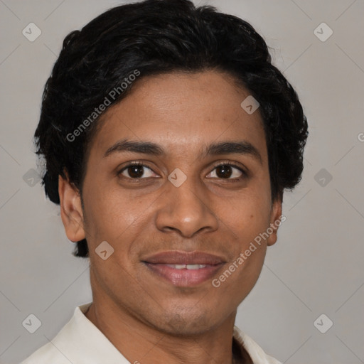 Joyful latino young-adult male with short  brown hair and brown eyes