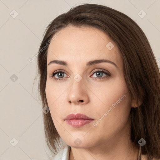 Neutral white young-adult female with medium  brown hair and brown eyes