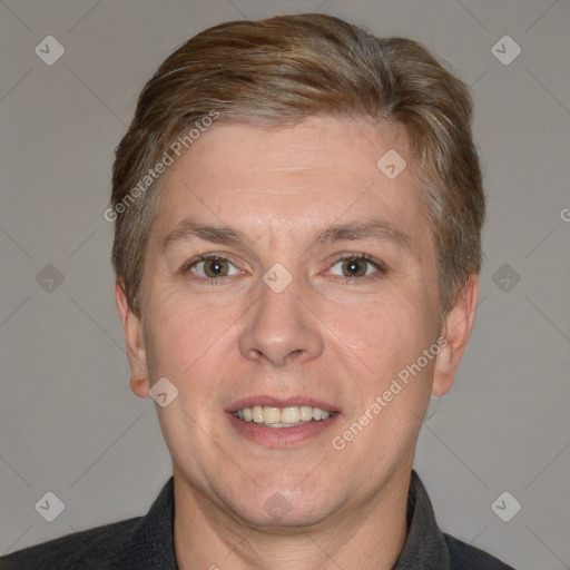 Joyful white adult male with short  brown hair and grey eyes