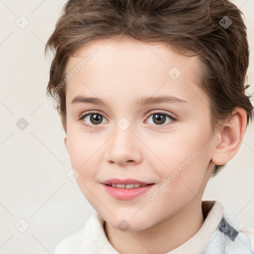 Joyful white child female with short  brown hair and brown eyes