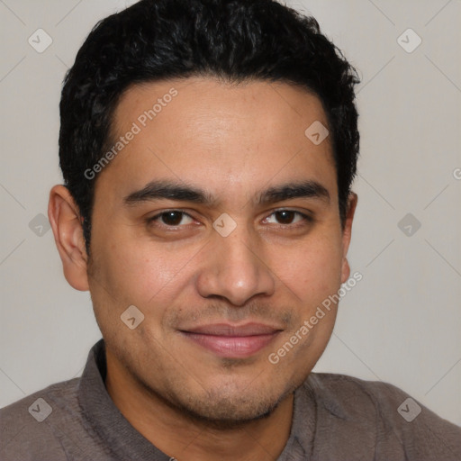 Joyful latino young-adult male with short  brown hair and brown eyes