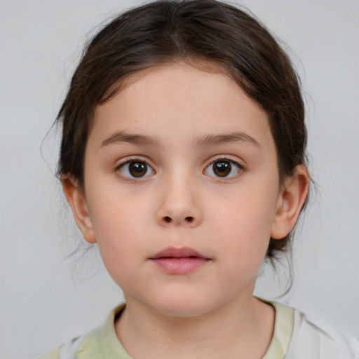 Neutral white child female with medium  brown hair and brown eyes