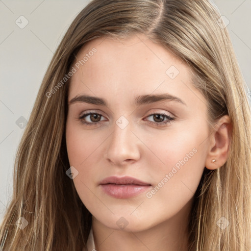 Neutral white young-adult female with long  brown hair and brown eyes