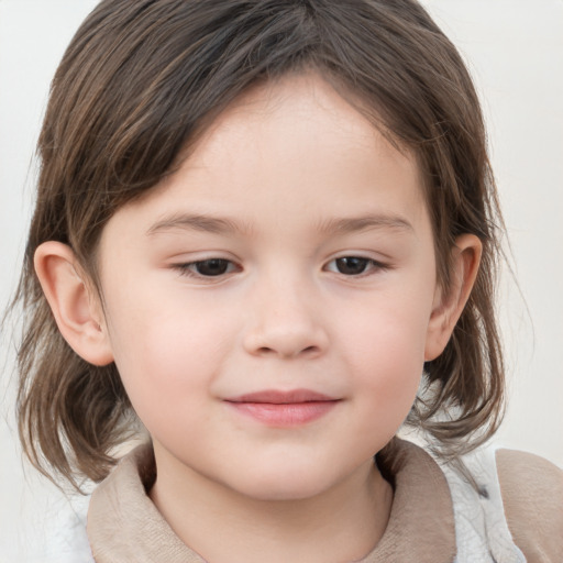 Joyful white child female with medium  brown hair and brown eyes