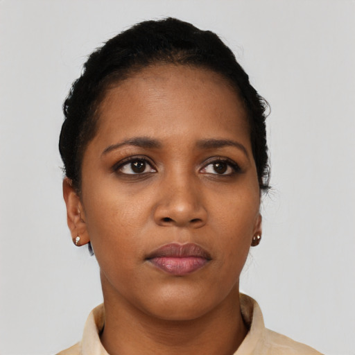 Neutral black young-adult female with short  black hair and brown eyes