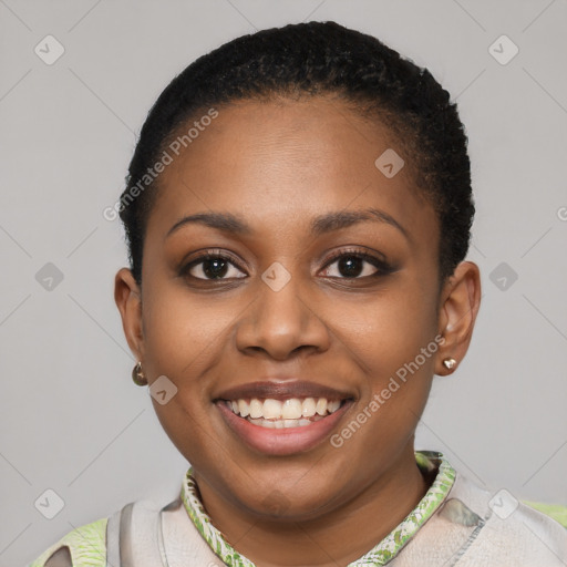 Joyful black young-adult female with short  brown hair and brown eyes