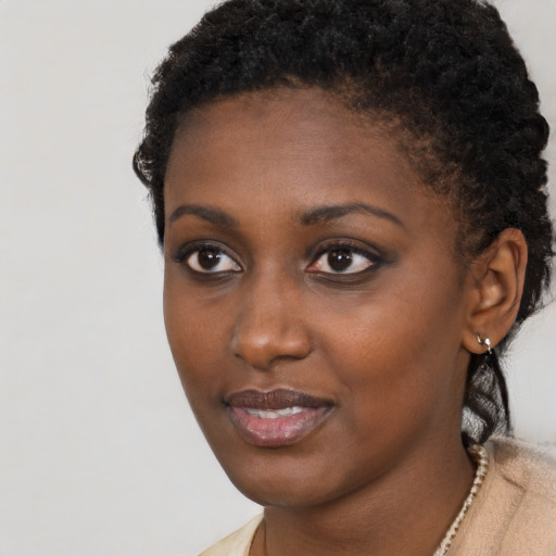 Neutral black young-adult female with short  black hair and brown eyes