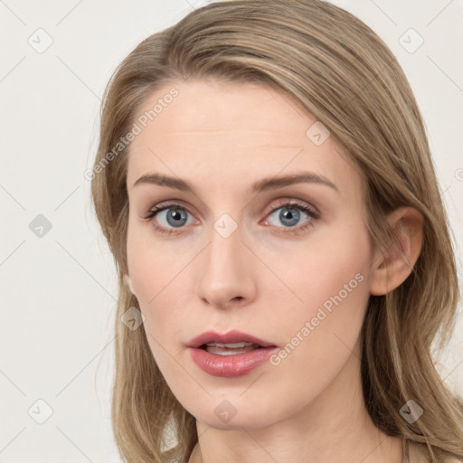 Neutral white young-adult female with long  brown hair and grey eyes