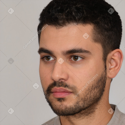 Neutral white young-adult male with short  black hair and brown eyes