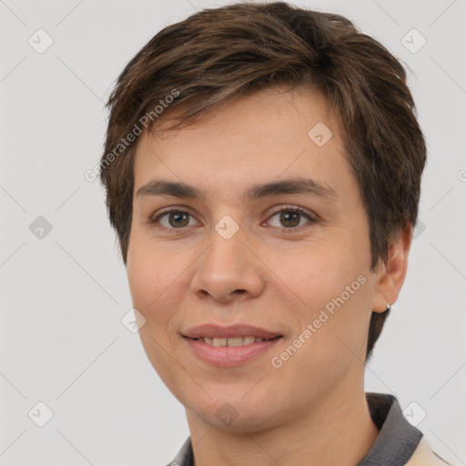 Joyful white young-adult female with short  brown hair and brown eyes