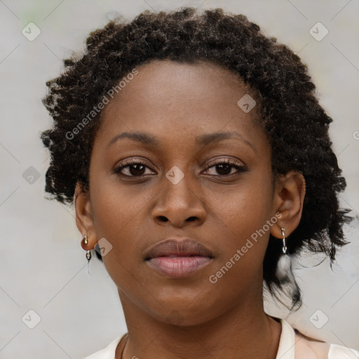 Neutral black young-adult female with short  brown hair and brown eyes