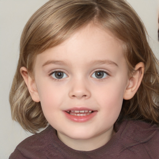 Joyful white child female with medium  brown hair and grey eyes