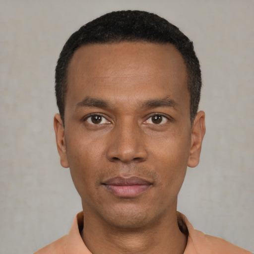Neutral black young-adult male with short  black hair and brown eyes