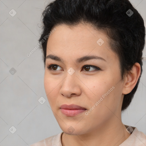 Joyful asian young-adult female with short  brown hair and brown eyes