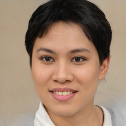 Joyful asian young-adult female with short  brown hair and brown eyes