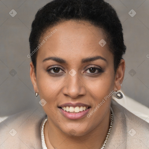 Joyful latino young-adult female with short  black hair and brown eyes