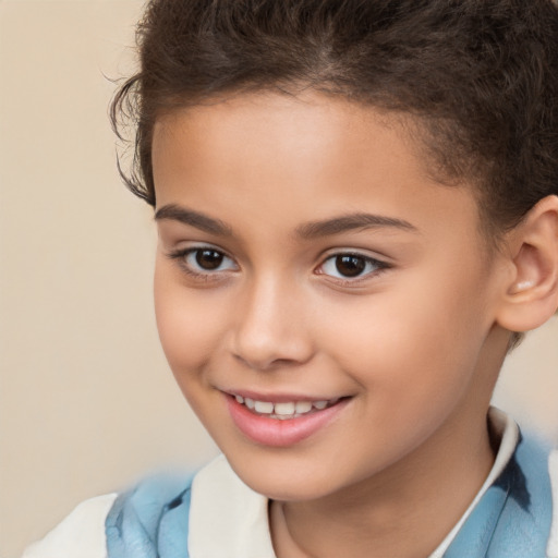 Joyful white child female with short  brown hair and brown eyes