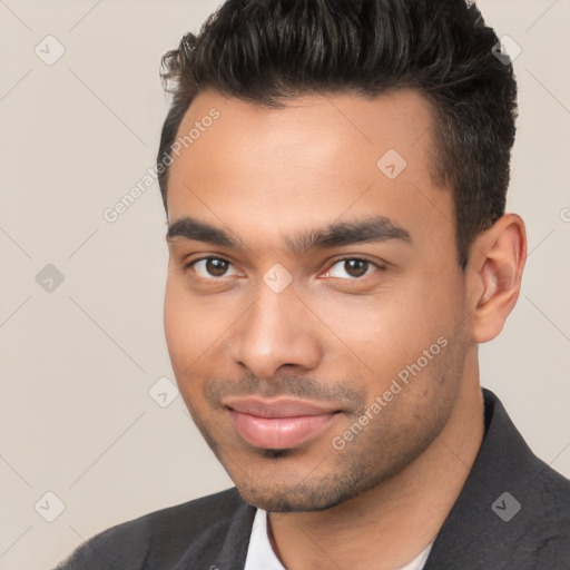 Joyful white young-adult male with short  black hair and brown eyes