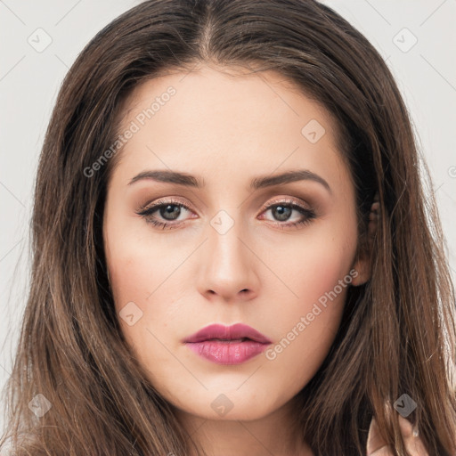 Neutral white young-adult female with long  brown hair and brown eyes