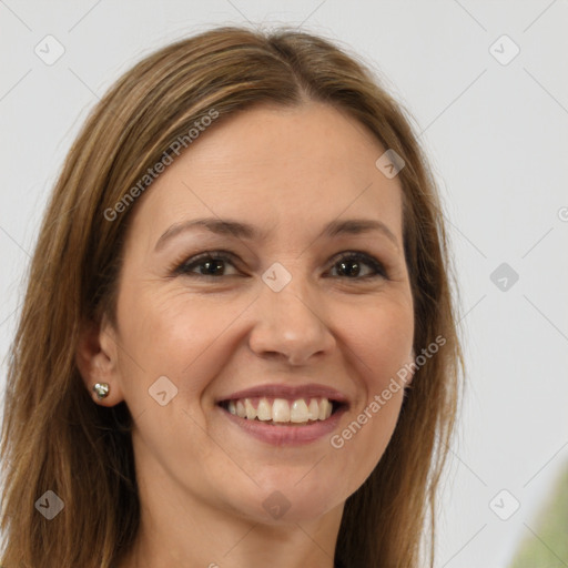 Joyful white young-adult female with long  brown hair and green eyes