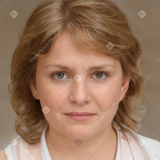 Joyful white young-adult female with medium  brown hair and blue eyes