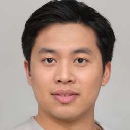 Neutral asian young-adult male with short  black hair and brown eyes