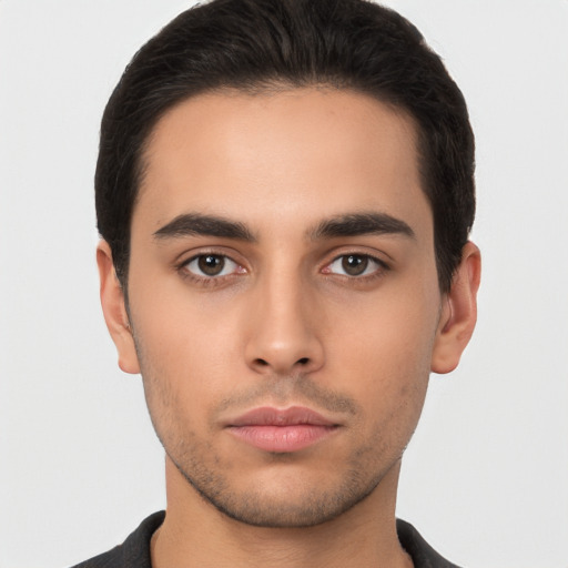 Neutral latino young-adult male with short  black hair and brown eyes