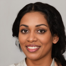 Joyful latino young-adult female with medium  black hair and brown eyes