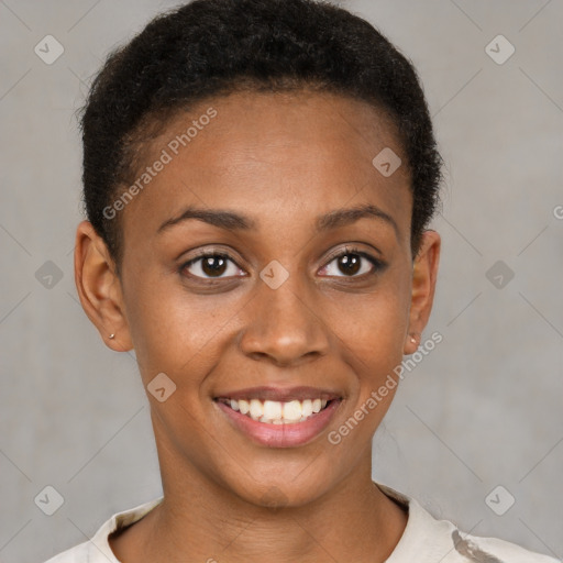 Joyful black young-adult female with short  brown hair and brown eyes