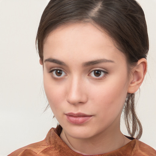 Neutral white young-adult female with medium  brown hair and brown eyes