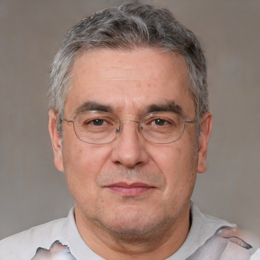 Neutral white middle-aged male with short  gray hair and brown eyes