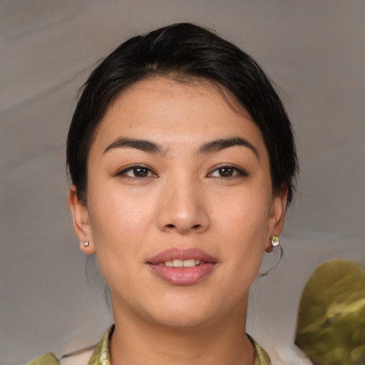 Joyful white young-adult female with medium  brown hair and brown eyes