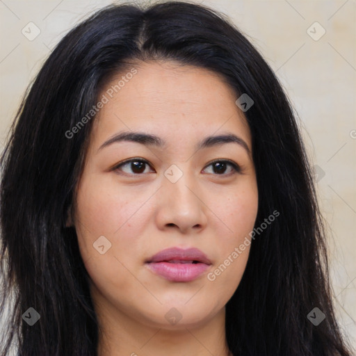 Joyful latino young-adult female with long  brown hair and brown eyes