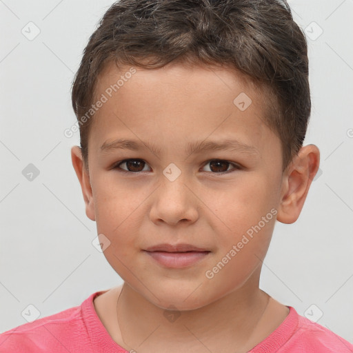 Joyful white child male with short  brown hair and brown eyes