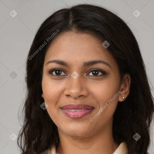 Joyful black young-adult female with long  brown hair and brown eyes