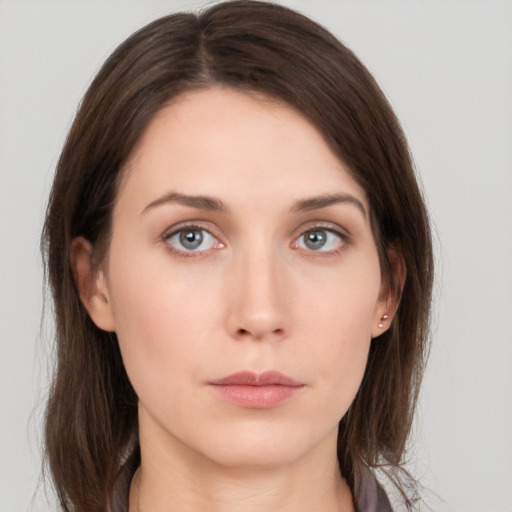 Neutral white young-adult female with long  brown hair and grey eyes