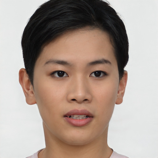 Joyful asian young-adult female with short  black hair and brown eyes