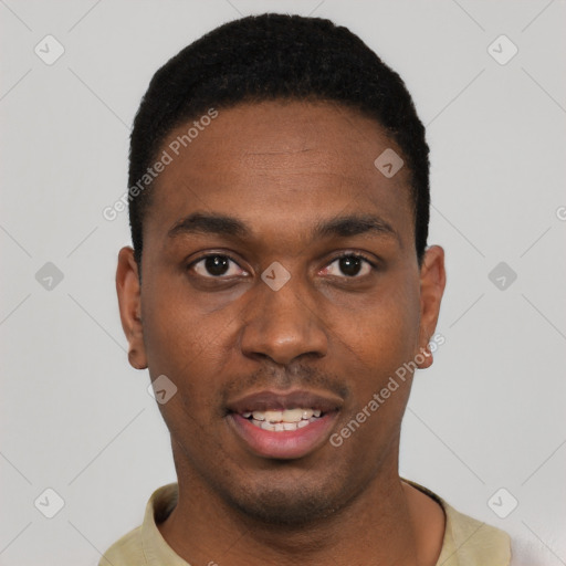 Joyful black young-adult male with short  black hair and brown eyes