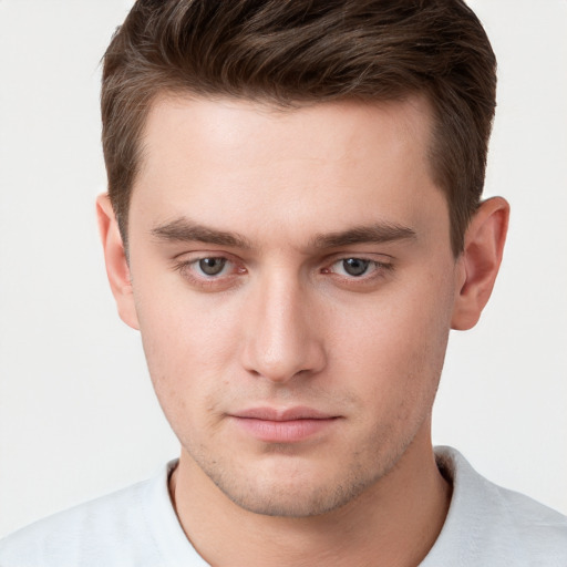 Neutral white young-adult male with short  brown hair and brown eyes