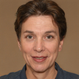 Joyful white adult female with short  brown hair and brown eyes