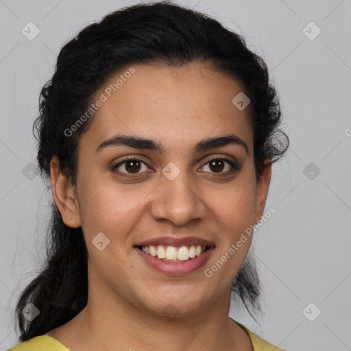 Joyful latino young-adult female with medium  brown hair and brown eyes