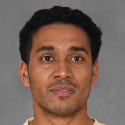 Neutral latino adult male with short  brown hair and brown eyes
