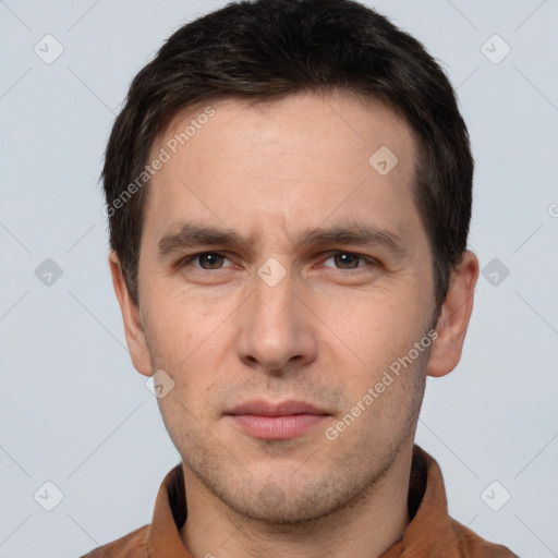 Neutral white young-adult male with short  brown hair and brown eyes