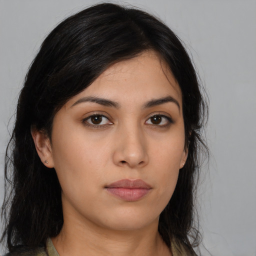 Neutral latino young-adult female with medium  black hair and brown eyes